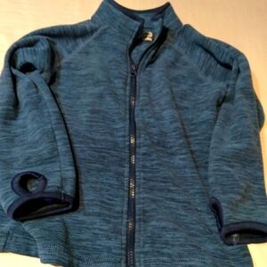 JUMPING bean brand Girls zip up thumb hole jacket. Blue print. Size Medi…